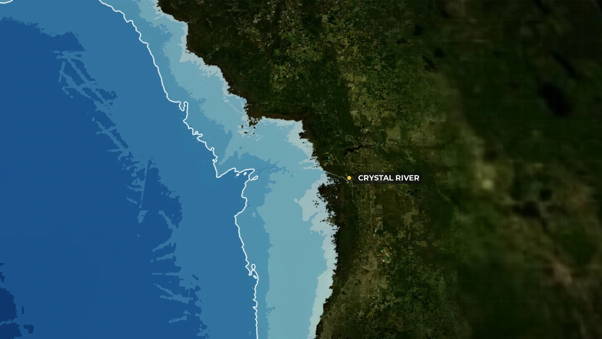 Frame from the film: satellite view of the Big Bend coast with the shelf shaded in bands of blue